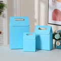 Three light blue matte kraft paper gift bags with handle and flap in different sizes - Blue