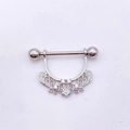 Detailed view of silver stainless steel nipple shield with heart patterns and zircon stones - Steel - Hollow Heart