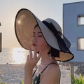 Elegant wide brim straw sun hat with black ribbon bow for beach vacations - M (56-58cm) / Beige Hat With Black Bowknot