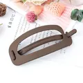 Matte brown rectangular cutout hair clip on a cozy Japanese-style prop background - Coffee