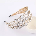 Elegant gold wavy headband with sparkling rhinestones in a multilayered vintage style - Three Rows All White Rhinestone