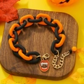 Halloween acrylic link bracelet in orange and black with a vampire lips pendant - Red Lips Pendant