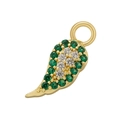 Macro shot of gold chili pepper pendant with sparkling green and white zircon stones - Gold Green Zircon Wings