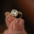 Luxurious 18K gold open ring with oval moonstone and sparkling diamond accents - Gold