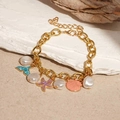 Gold ocean charm bracelet with baroque pearls, starfish and colorful seashells - Double Starfish Color Pendant Chain Bracelet