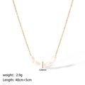 Detail showing 4.8mm freshwater pearls on 18K gold plated chain with length dimensions - Baroque Pearl Smile Necklace (YYN023057)