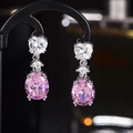 Elegant drop earrings with oval pink main stone and heart-shaped white accents - A Pair Of Pink Diamond Leds-123