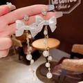 Elegant bow pearl tassel earrings in gold and white finish on a 925 silver needle - Bow Pearl Thin Chain Tassel Earrings (E0203)