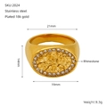 Macro view of gold stainless steel ring with flower engraving and zircon frame detail - Size 6 (ZR2024G-6)