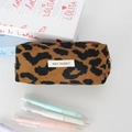Close-up of leopard print corduroy makeup bag with white label and zipper detail - Coffee Leopard