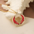 Collana vintage dorata con ciondolo pipistrello in smalto rosso e cristalli luccicanti - Pipistrello Rosso