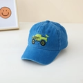 Close-up of kids denim baseball cap featuring a yellow monster truck embroidery - 52cm 2-5 Years Old / Blue