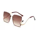 Chic oversized square sunglasses with gradient brown lenses and snake-shaped metal legs - Golden Frame/Brown Gradient Lens