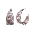 Chic C-shaped acetate earrings with grey and brown marble texture on white background - Gray