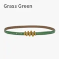 Adjustable grass green leather skinny belt with a wave-shaped gold-tone metal buckle - Grass Green