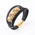 Mehrlagiges schwarzes geflochtenes Lederarmband mit drei goldenen Löwenköpfen und Magnetverschluss - Gold
