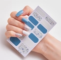 Blue and white minimalist nail stickers set AF-46 with glitter accents shown on nails - AF-046 (Blue/White/Colorful Sequins)