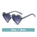 Transparente graue Herz-Sonnenbrille mit Silberglitzer und gewellten Rändern - Gelee Grau