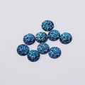Macro detail of 12mm blue resin rhinestones with sparkling starry mineral texture - 12mm / Blue (19)