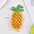 Handmade knitted pineapple hair clip accessory for girls measuring 8.5cm by 3.2cm - Pineapple