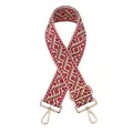 Close-up of jacquard geometric pattern bag strap with gold rotating metal hooks - Red