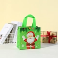 Christmas theme non-woven gift bag with green cartoon Santa Claus and festive snowflakes - Small / Green