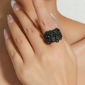 Gothic punk matte black wide ring featuring multiple skull designs worn by model - Matte Black Large Skull Pile Band Ring (A-657)