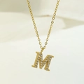 Golden M-shaped letter pendant necklace with sparkling micro-paved cubic zirconia - M / Gold