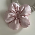 Close-up of pink satin flower hair tie with smooth silk texture on white surface - Five-Petal Scrunchie - Pink (Standard)