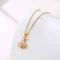 Elegante collar de acero de titanio dorado con circonitas blancas de pera y rectángulo - Dorado