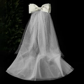 White bridal hair clip with satin bow and layered tulle veil on black background - Double Layer Mesh Bow Veil / White