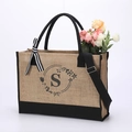 Jute tote bag with black canvas trim and letter S print including a striped ribbon strap - Letter S