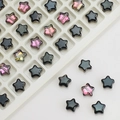Macro shot of 8mm star shaped glass beads in black and pink for DIY jewelry making - Half Gun Black Purple