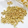 Polished gold round spacer beads for DIY jewelry making with smooth metallic finish - 2mm / Gold