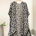 Detail of summer printed satin shawl with sleeve holes and geometric black and white pattern - One Size / Maze Print