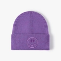 Winter purple knitted beanie hat with a minimalist 3D embroidered smiley face pattern - One Size / Heather Purple