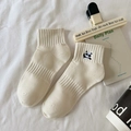 Beige cotton socks for women featuring a cute panda embroidery in a cozy flat lay - Front Panda-Beige