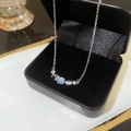 Silver titanium necklace featuring a light blue gemstone with starfish and seashell charms - Starfish Shell Light Blue Stone Pendant (X1011 Silver)