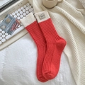 Winter rib-knit wool socks in red and white with brand label detail on white background - One Size / 452 Red