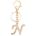 Detailed close-up of golden alphabet letter N keychain with sparkling inlaid rhinestones - Letter N