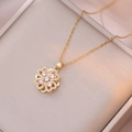 Elegant rose gold clover necklace with pink cubic zirconia in a premium jewelry box - Gold Pink Rotating Necklace (X0104)