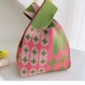 Pink and green geometric knit handbag with contrasting colors and thick woven texture - Pink Gypsophila