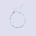 Detail of silver chain bracelet with green enamel beads and adjustable lobster clasp - Steel + Green