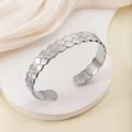 Elegant silver stainless steel open bangle with textured diamond weave pattern for women - Rhombus Woven / Steel