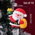 Christmas Santa Claus soft rubber cake toppers set of 10 pieces with festive designs - Soft Glue Santa Holding Gifts 10Pcs
