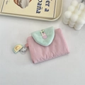 Close-up of a cute pink and mint green coin purse with a soft plush flap and bear charm. - Light Pink