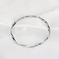 Minimalist Mobius twist silver polished stainless steel bangle on white silk background - Twisted Wave Style / Silver