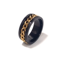 Detail view of black stainless steel spinner ring with inner golden chain for men - Black Base Gold Chain Engraved