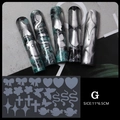Macro detail of Gothic nail art stencils with bow, heart, and butterfly motifs for long nails - Nail Mold Style G