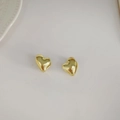 Polished gold heart-shaped hoop earrings with a glossy mirror finish in a minimal style - Gold Heart Ear Buckle